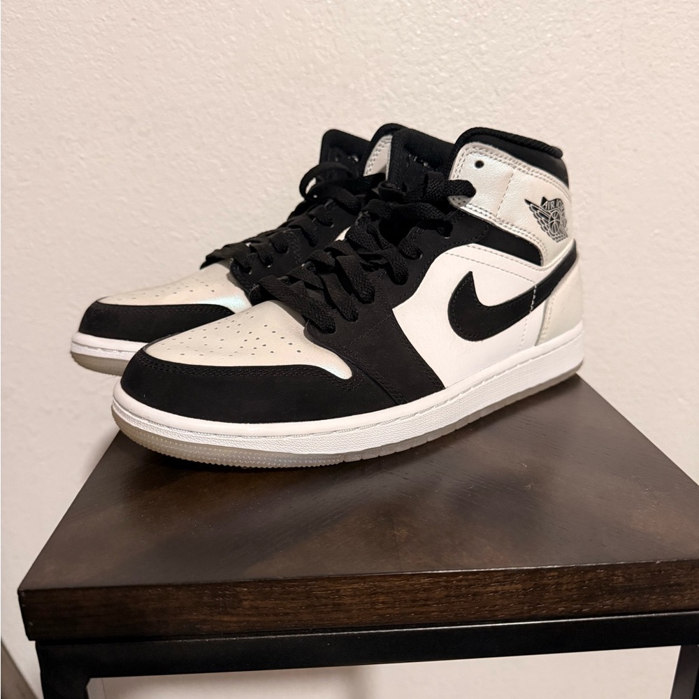 Nike Black and White Mid-Top Sneakers